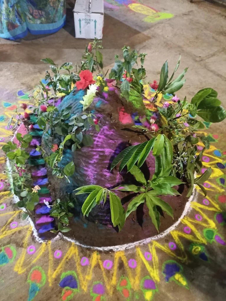 Tulsi plant decorated with rangoli