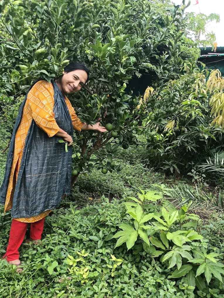 Meeta in the aashram's organic orchard